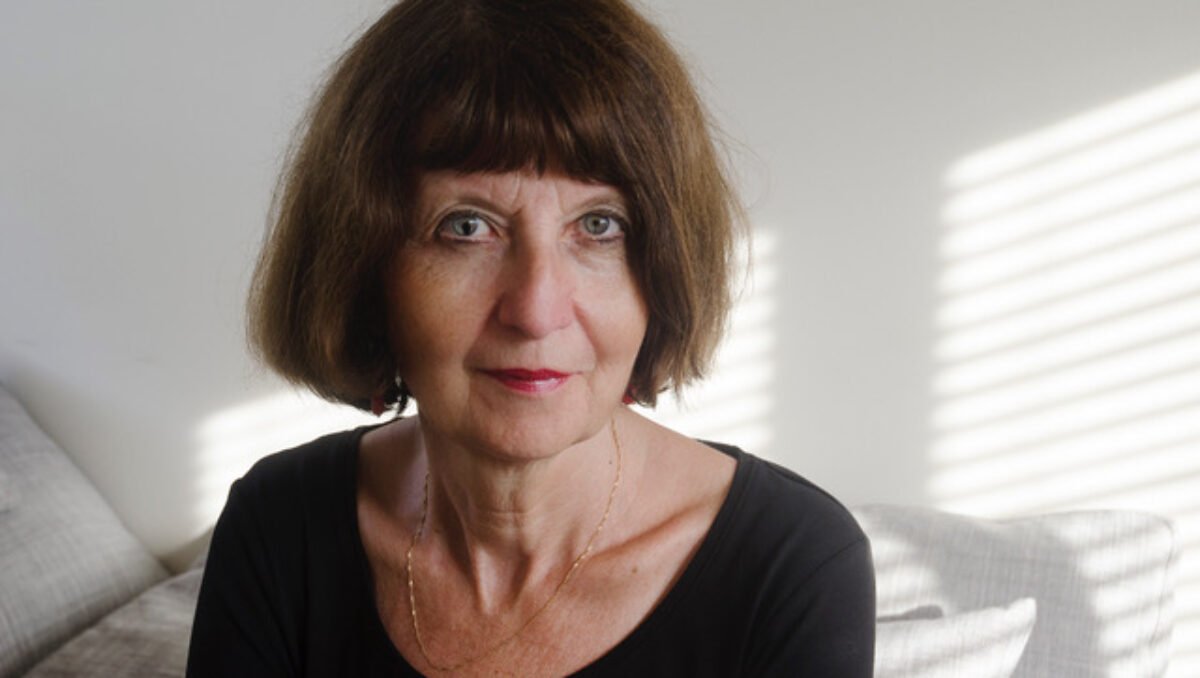 Marie Lundquist Woman with short dark bob and black shirt looks at the camera.